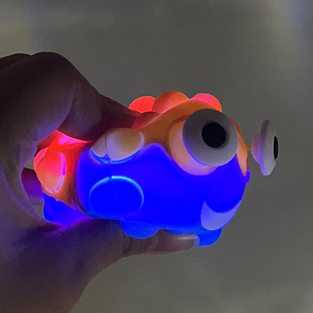 Popular silicone pops eye out fidget toys relieve stress popping squeeze light up ball toys for kids and adult