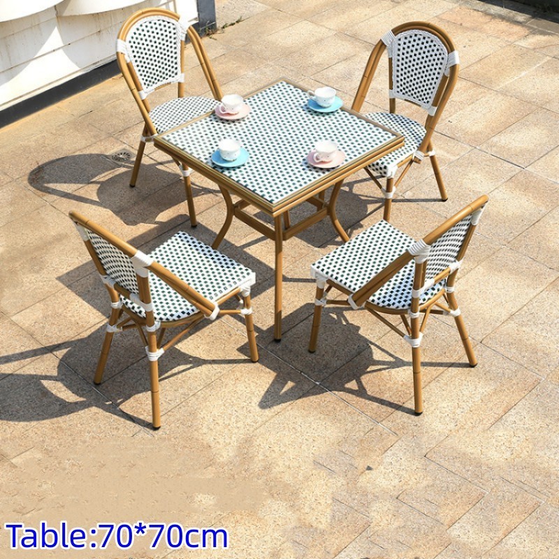 Outside French bistro rattan table and chairs outside patio garden french restaurant table and chairs