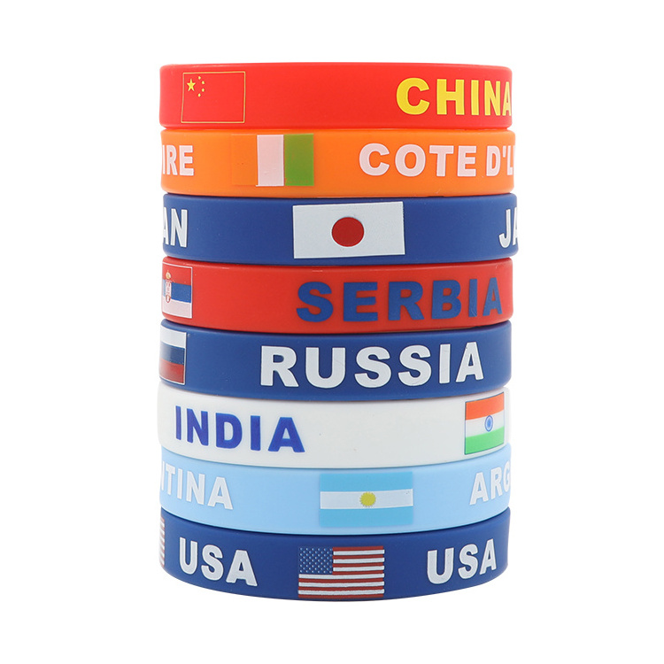 Supplier Wholesale Engraved Logo 2022 Qatar Rubber Wristband In Ghana Slava Silicon Flag Bracelet