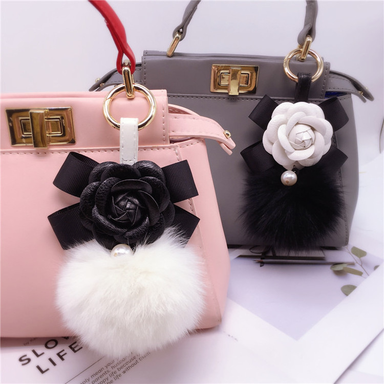 Factory Price flower Keyring charm pendant women bag fur ball key chain cute puffy bunny plush fluffy furball keychain