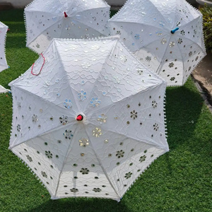 Elevate your special day with the exquisite Hand-Crafted Cotton Victorian Lace Embroidery Wedding Decoration Umbrella Bridal Par