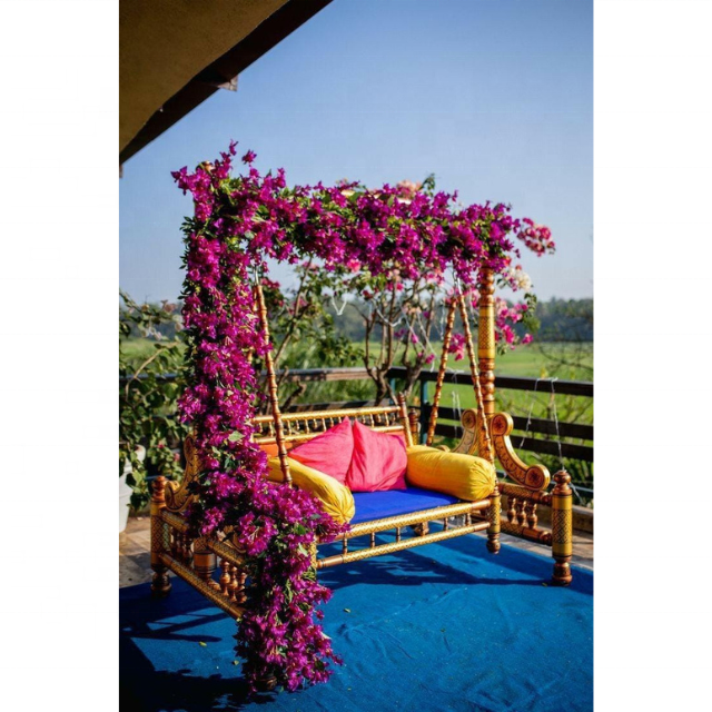 Wedding swing for the beautiful bride and groom to sit and use it in every event of wedding function and decoration .