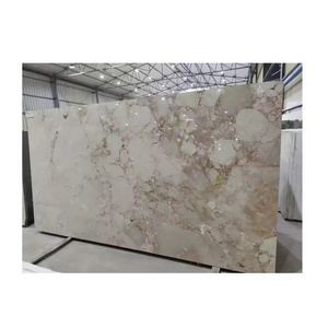 High on Demand Beige Pattern Italian Marble Slab used for Floors Countertops and other Architectural Purposes