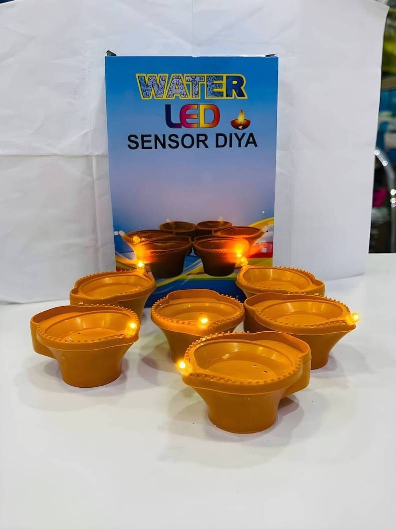 Electrical Water Sensor LED Diya Candle with Water Sensing Technology Ambient Lighting Battery Operated Led Diya For Home Decor