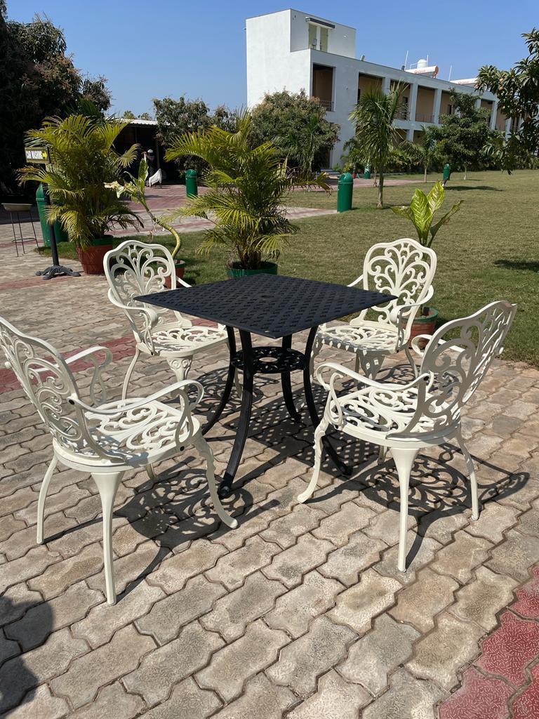 White Outdoor Garden Chair  Ornate Cast Iron Frame  Perfect for Gardens  Patios and Porches  Enhance Your Outdoor Living Space