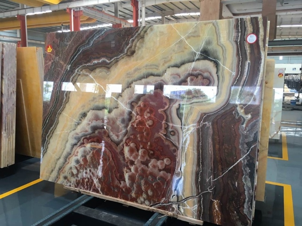 Pakistan red onyx marble slab price