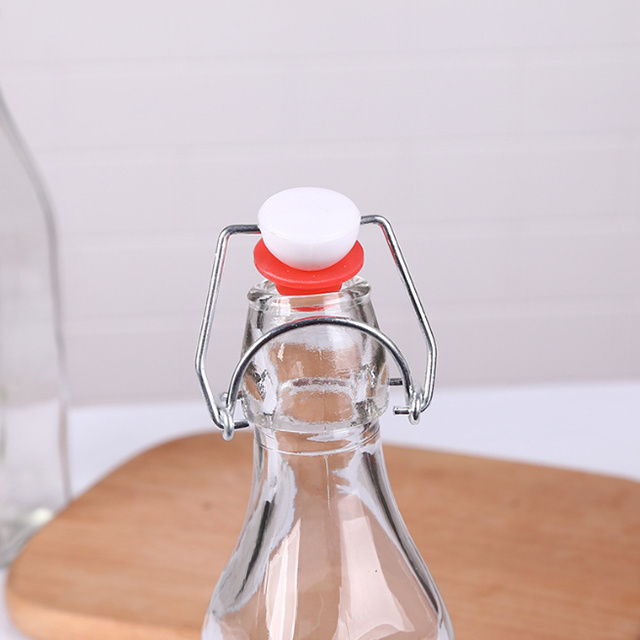 For Amazon Hotsale Clip Lid Water Bottle Customized Swing Stopper Top Glass Bottle for Beverage Cola Beer Wine with Swing Lid