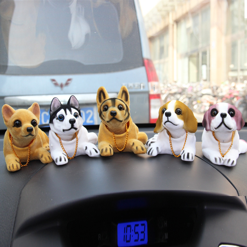 Resin shaking head dog new car decoration spring Zhaofu dog car accessories