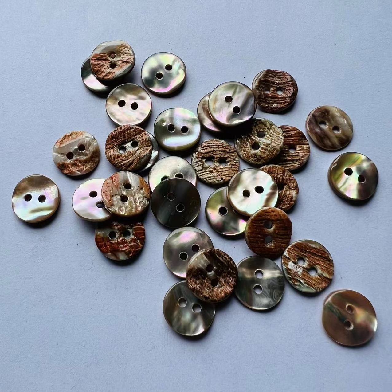 China factory wholesale custom all sizes of natural sea shell buttons natural abalon shell for garment clothes blouse