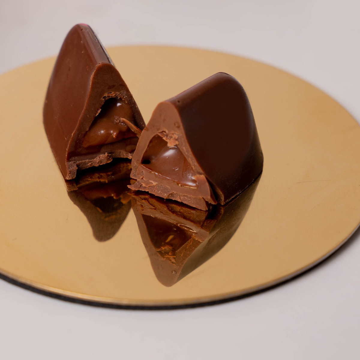 Luxury Italian dark and milk chocolate with hazelnut filled with Gianduia cream Soft Heart Gianduiotto