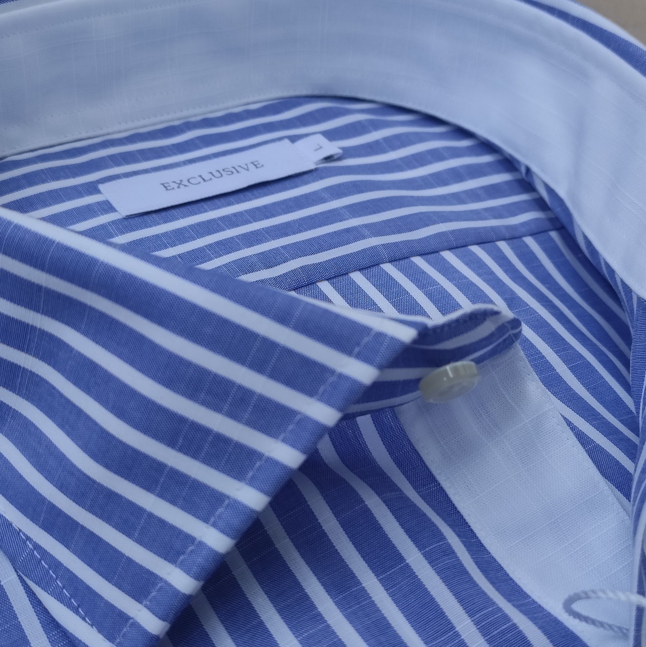 Men shirt in 100% high quality slub cotton white blue stripes following the Made in Italy tradition export