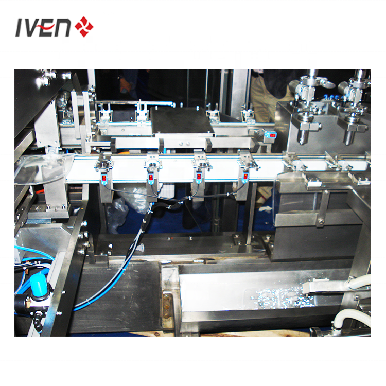 Reduce 1/3 Machine Length with Less Running Cost IV Fluids Filling Sealing and Packing Machine