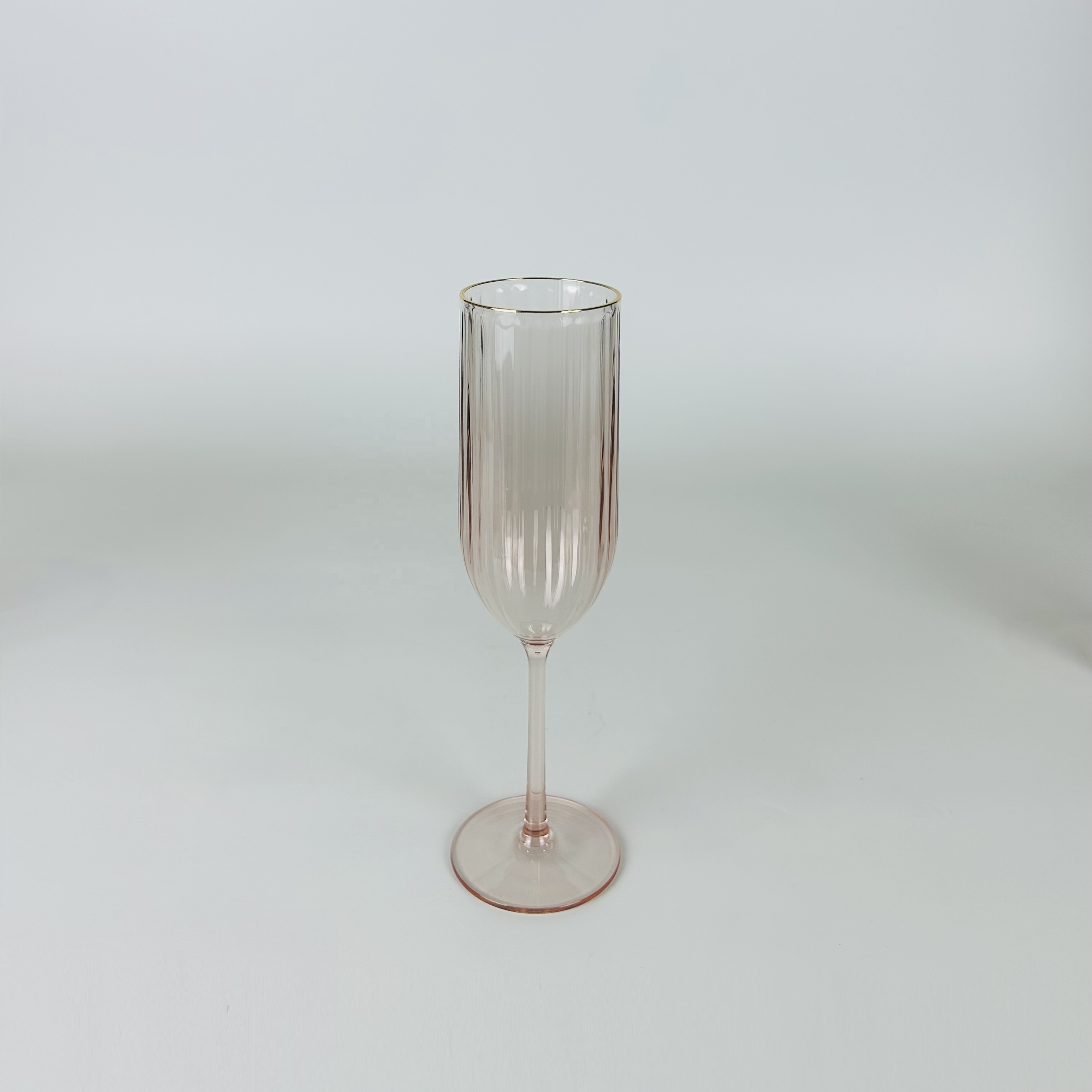 Decorative ribbed acrylic champagne glass