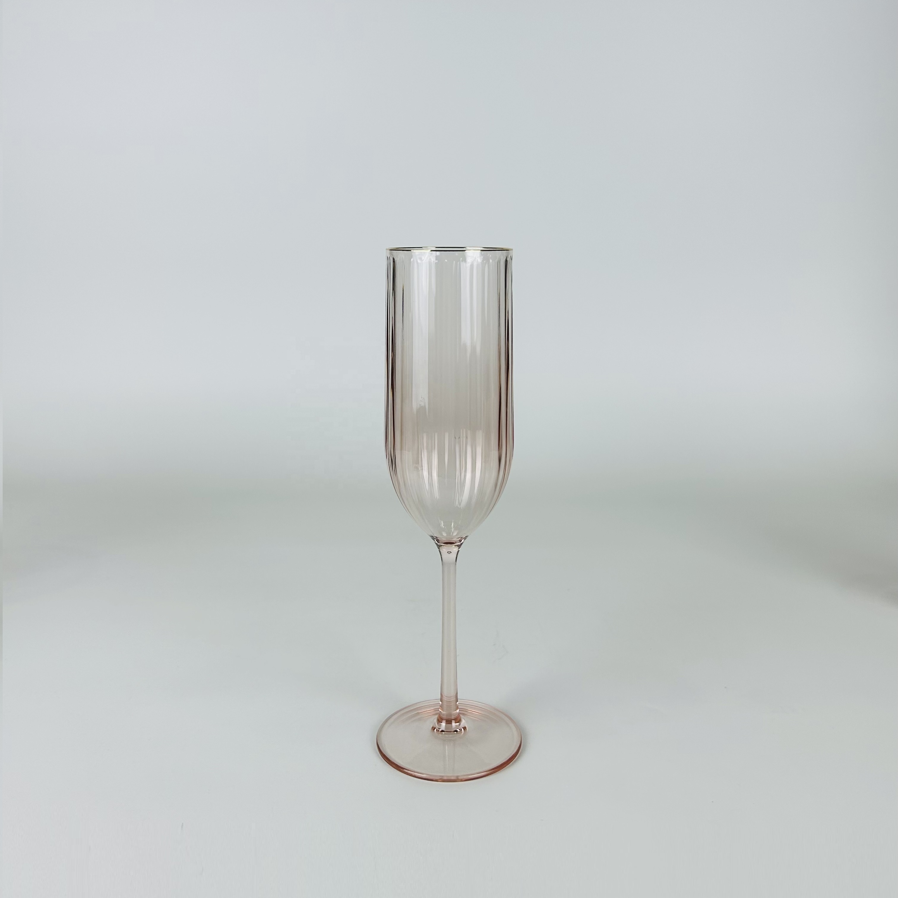 Decorative ribbed acrylic champagne glass