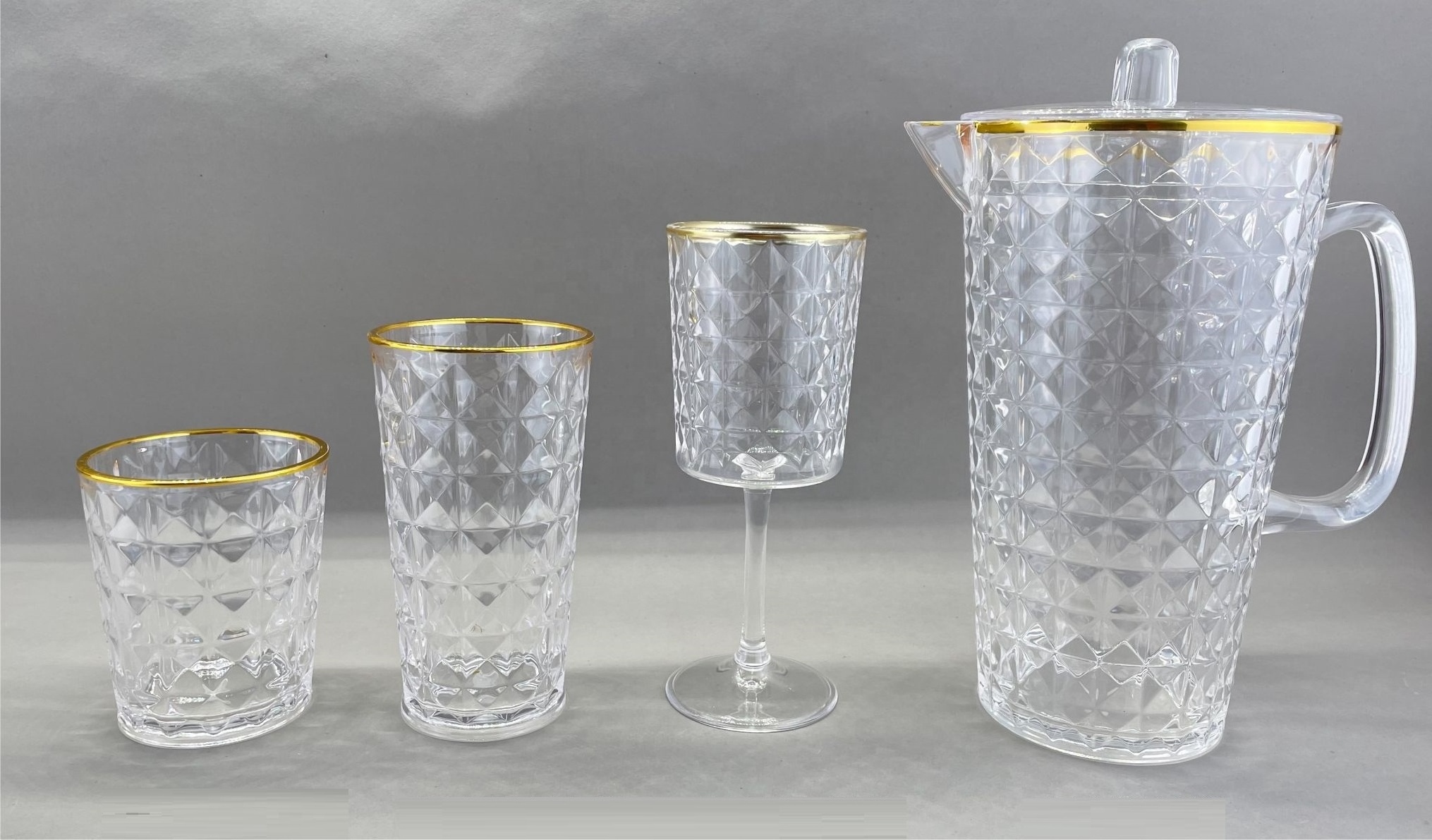 Gold rimmed acrylic plastic water goblet