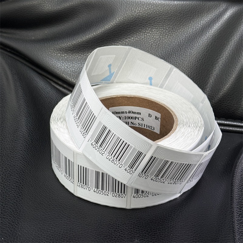 Wholesale e-Bit 8.2MHz Coated paper 4*4 cm White EAS system RF Soft Label with bar code for clothing shop anti-theft system