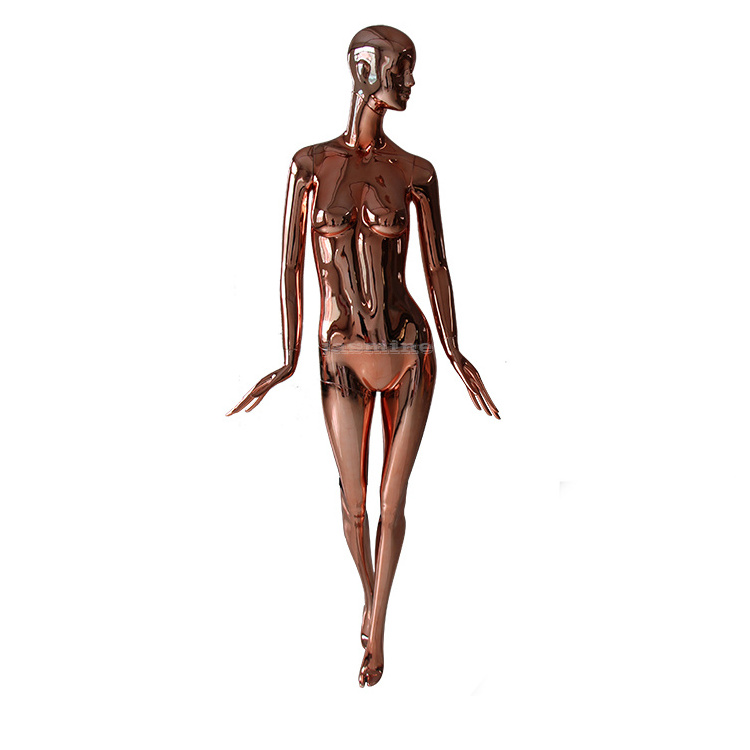 Displaying ladies dummy rose gold or gold full body chrome female mannequin