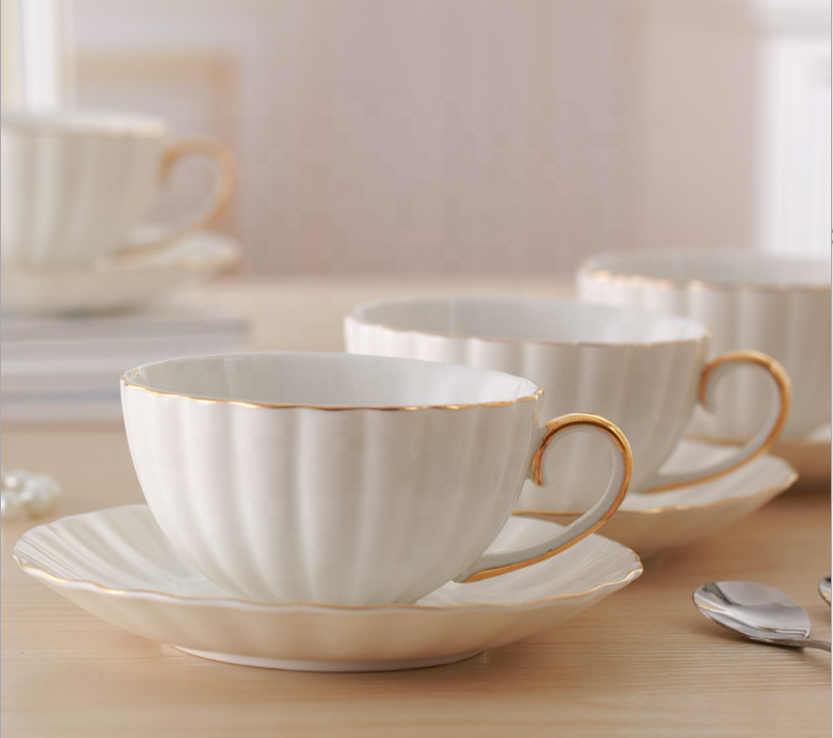 hot sale porcelain white embossed custom design ceramic cup and saucer gold rim bone china tea cups and saucers