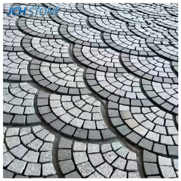 granite stone cubes pattern on mesh cobblestone paving stone Grauer Granit Wuerfel.Pflasterstein