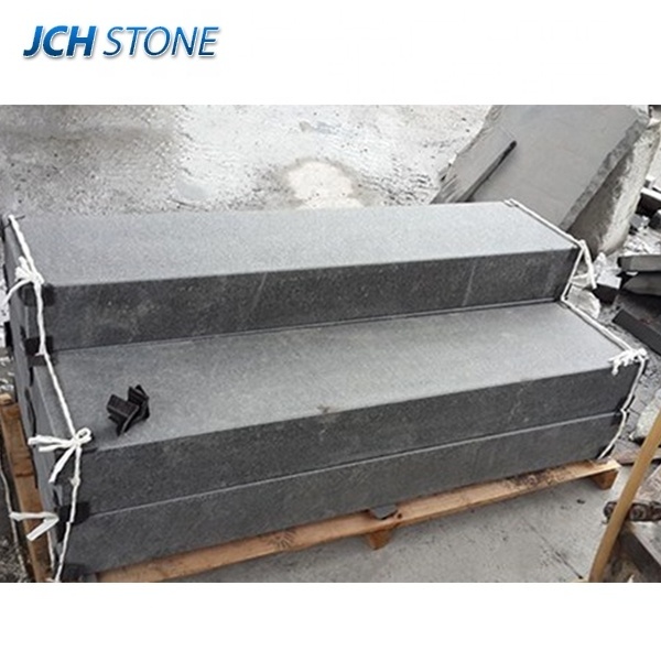 Outdoor dark grey granite stone steps stairs blocks flamed bushhammered