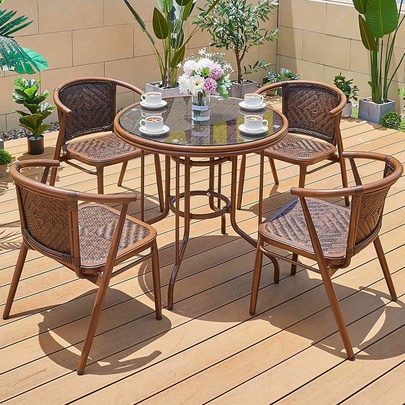 Factory selling outdoor rattan dining table and chair metal hotel courtyard restaurant lounge furniture rattan patio garden set