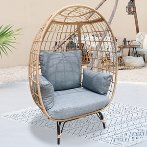 Cheap price wicker outdoor furniture rattan egg chair with 4 legs stand oversize garden patio swing egg chair with thick cushion