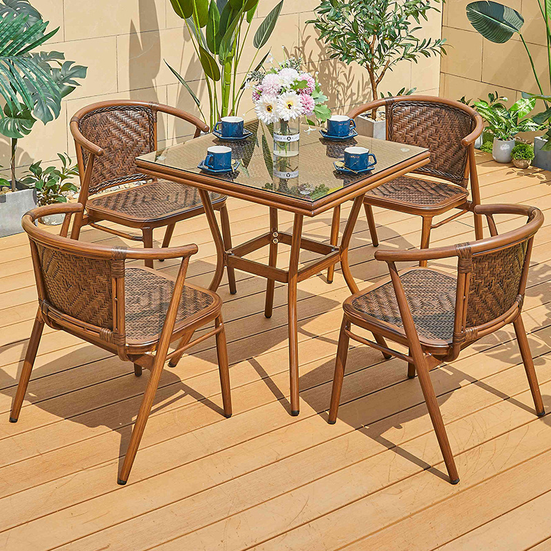 Factory selling outdoor rattan dining table and chair metal hotel courtyard restaurant lounge furniture rattan patio garden set