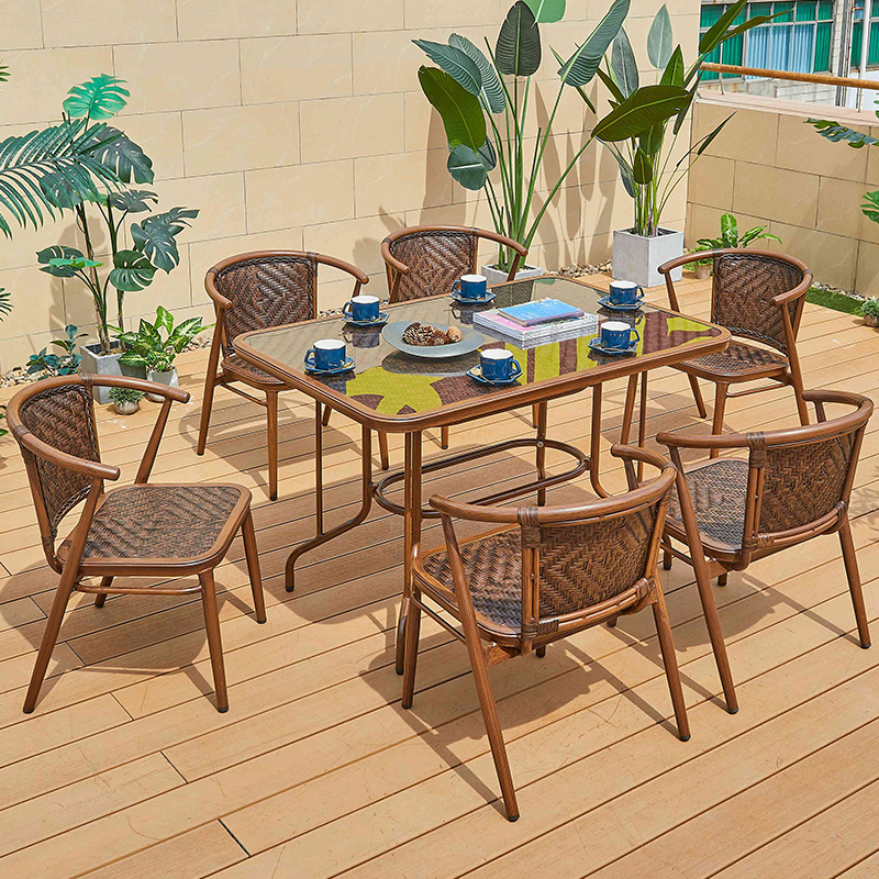 Factory selling outdoor rattan dining table and chair metal hotel courtyard restaurant lounge furniture rattan patio garden set