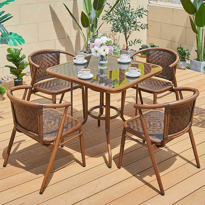 Factory selling outdoor rattan dining table and chair metal hotel courtyard restaurant lounge furniture rattan patio garden set