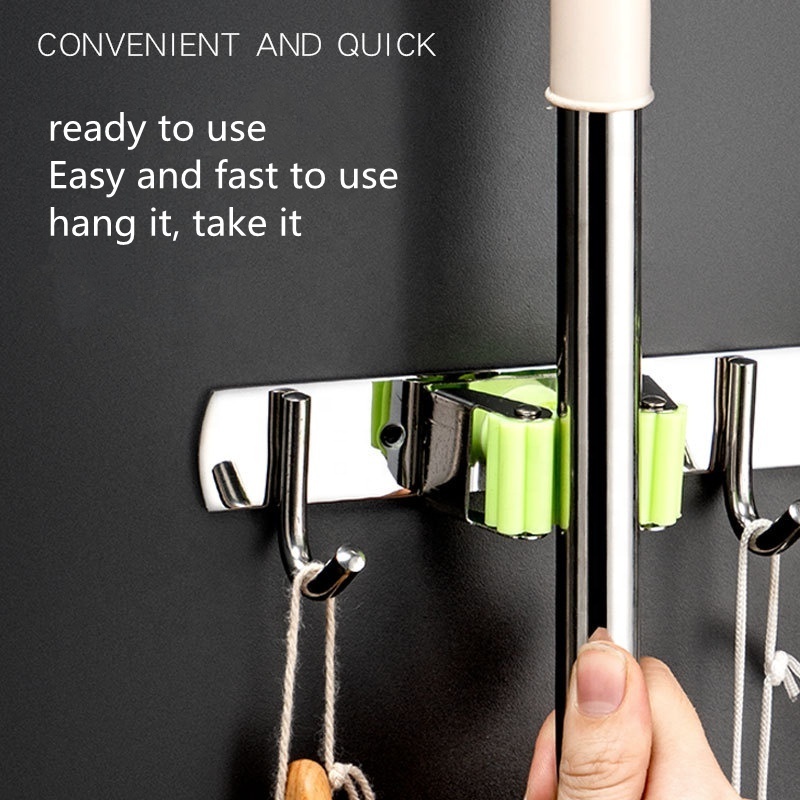 Broom and Mop Holder Organizer and Storage Clip Wall Mount Broom Gripper Holds Self Adhesive Mop Storage Rack