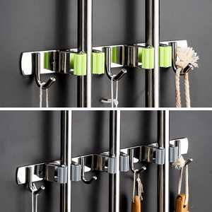 Broom and Mop Holder Organizer and Storage Clip Wall Mount Broom Gripper Holds Self Adhesive Mop Storage Rack