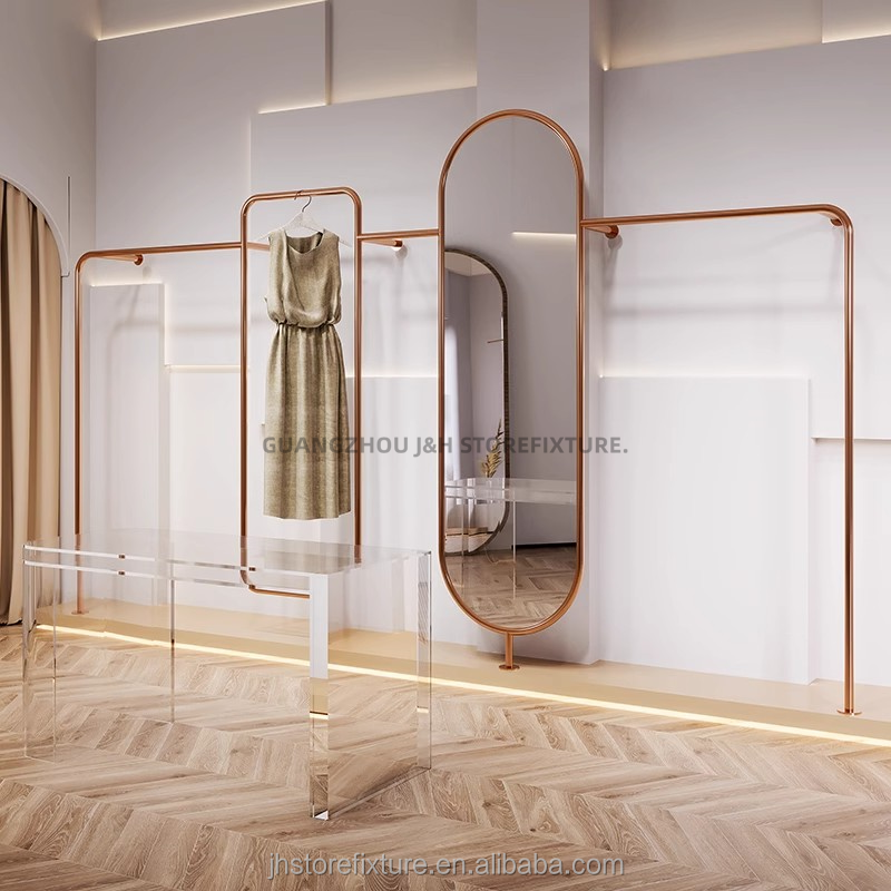 Wall mounted store display rack for clothes rose gold clothing rack display with mirror for boutique display dress