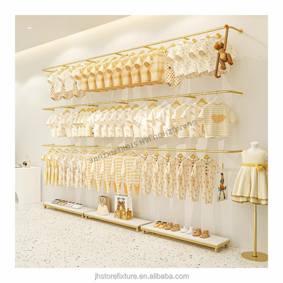 Interior design hanging rack clothes display wall mounted stainless steel gold clothes display rack for shop custom