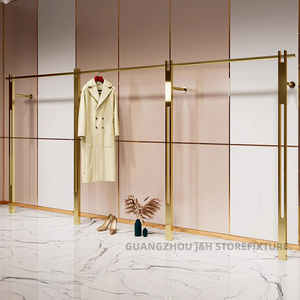 Floor-Style Shelf Luxury Gold Clothing Rack adjustable feet Boutique Display Clothes Rack Retail Use Modern Garment Rack