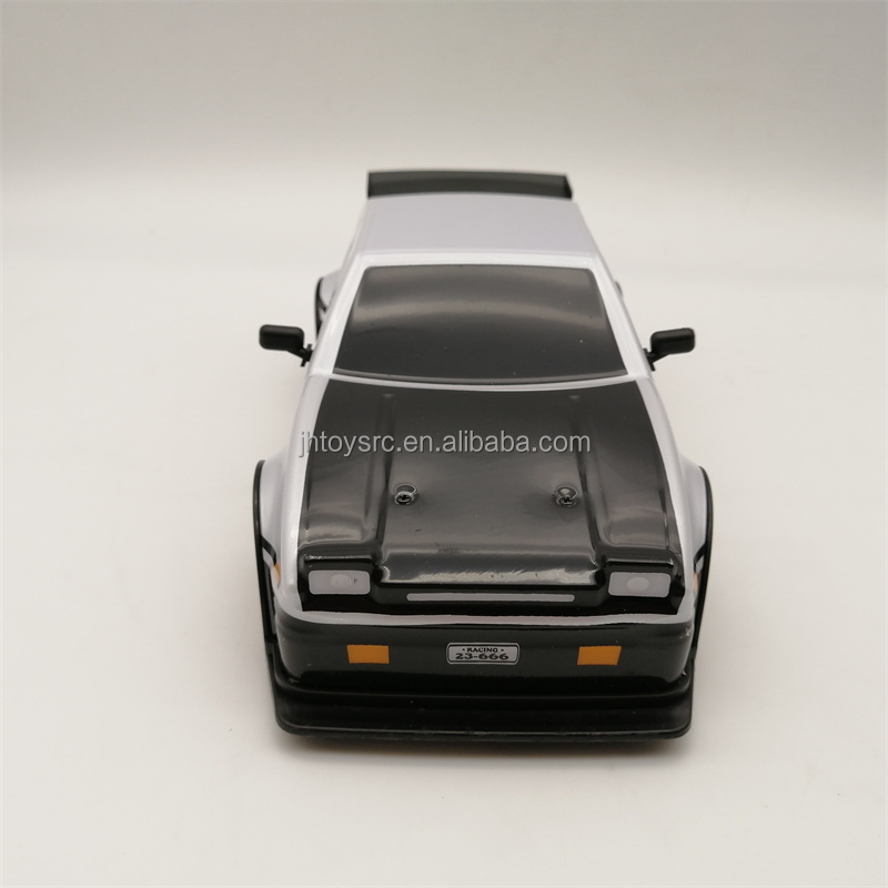 2.4G 1:24 RC Car Drift 4WD Remote Control Drift Racing Car PVC Cover Body with Replaceable Tires and Modula Battery