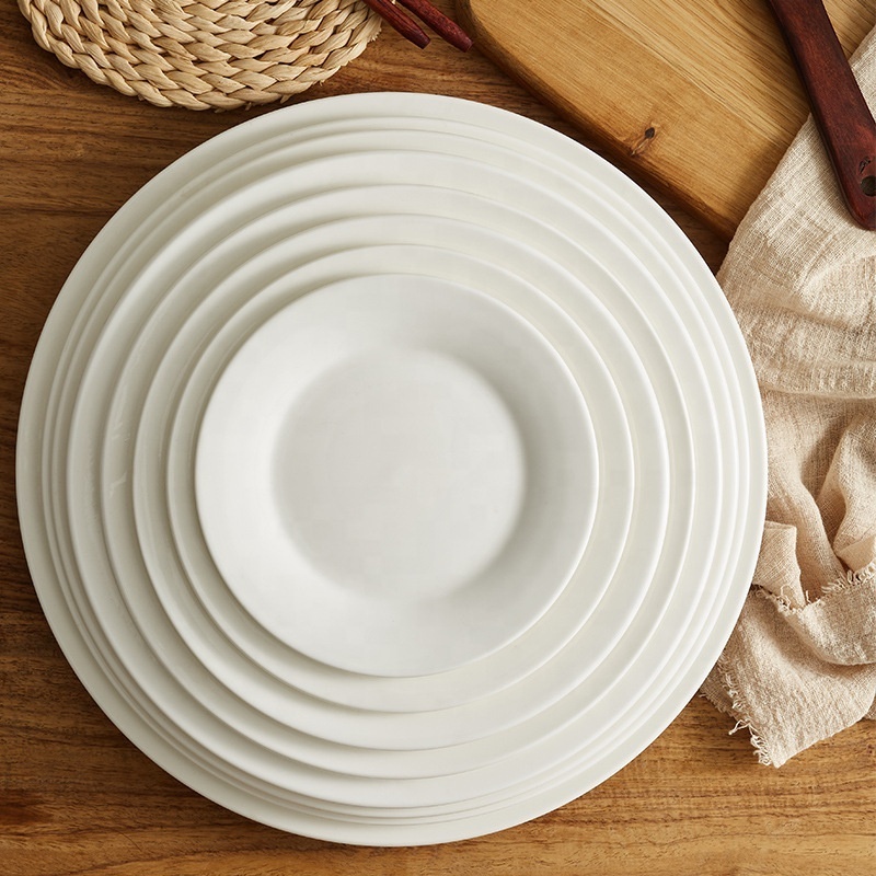 Wholesale cheap bulk stock ceramic flat plate round white blank ceramic serving platters