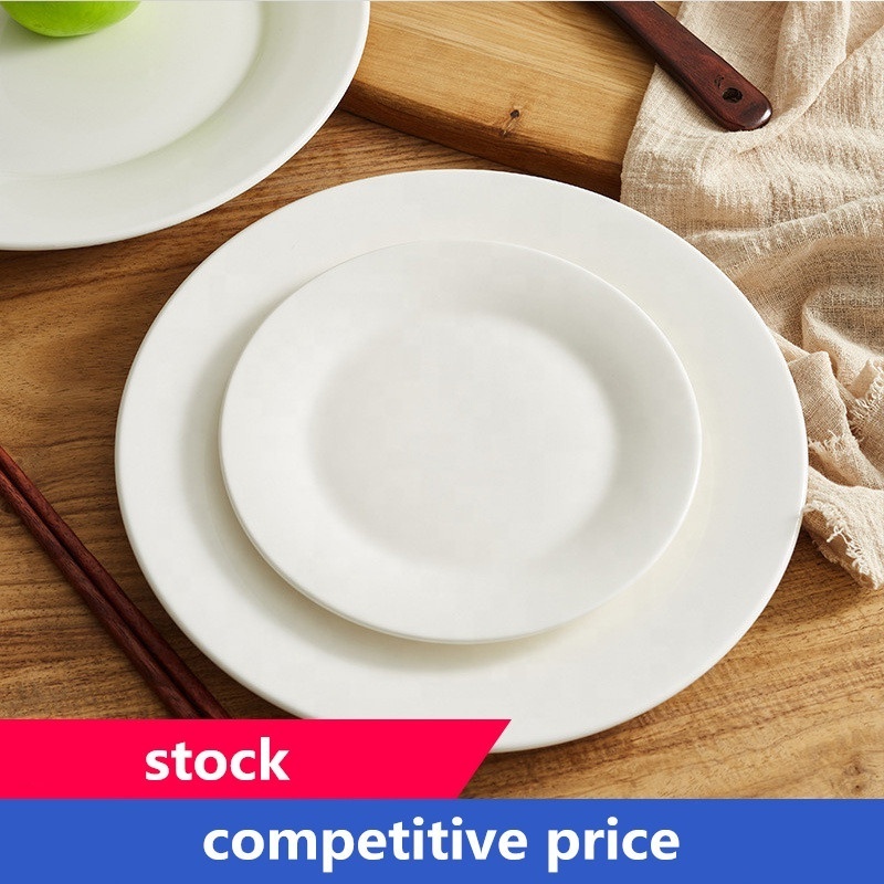 Wholesale cheap bulk stock ceramic flat plate round white blank ceramic serving platters