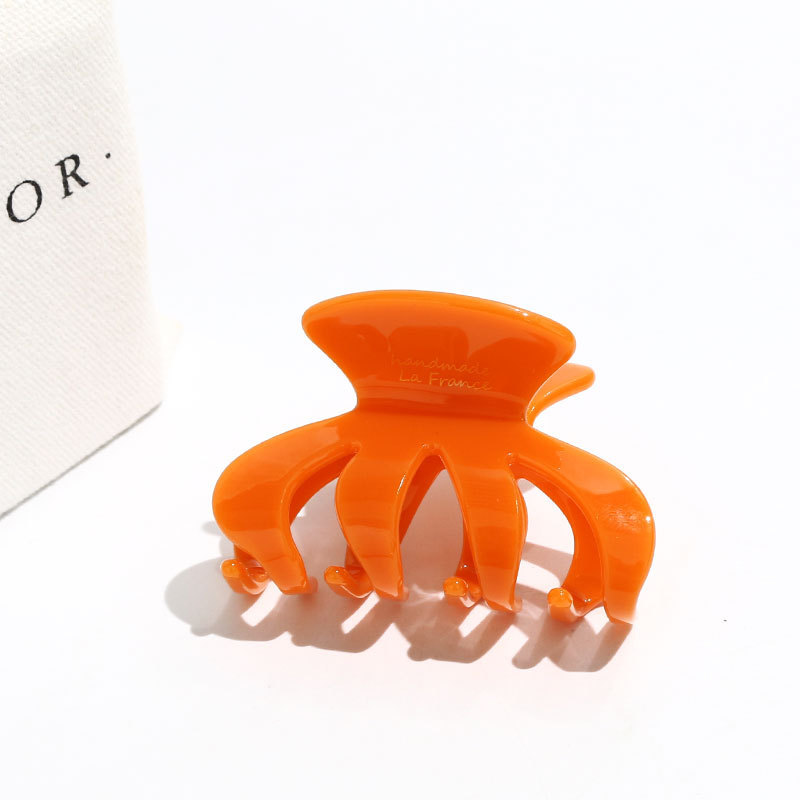 XinMei wholesale strong bio acetate octopus hair claw clip high quality pumpkin color haarklammer hair clamp claw clip for women