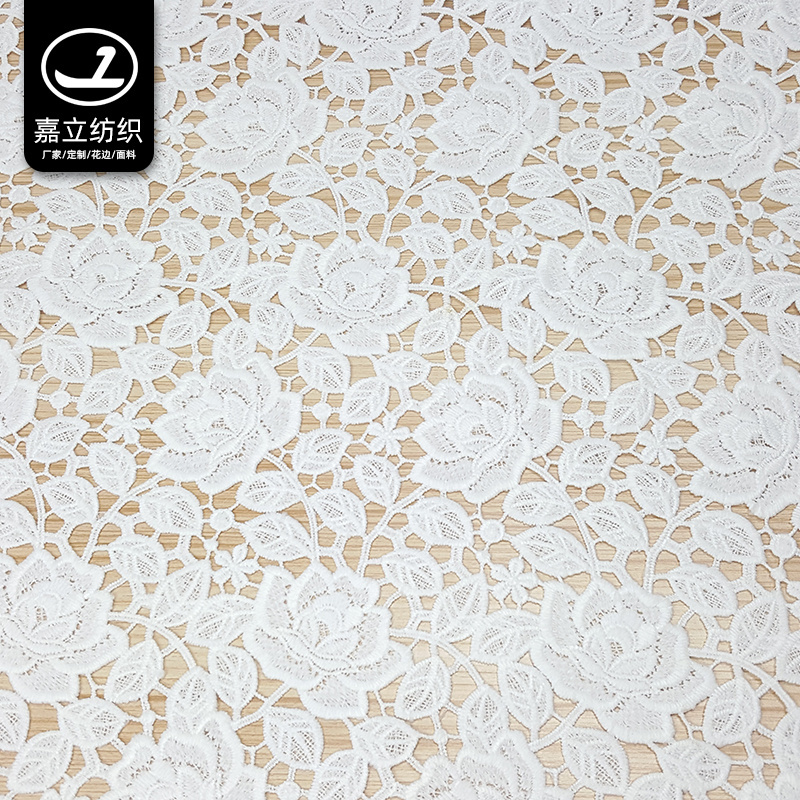 High quality white soft hollow water-soluble polyester 3D flower embroidery lace fabric for women