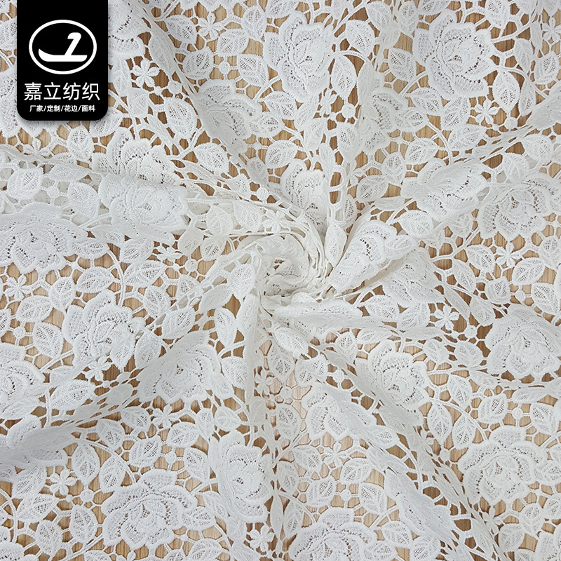 High quality white soft hollow water-soluble polyester 3D flower embroidery lace fabric for women