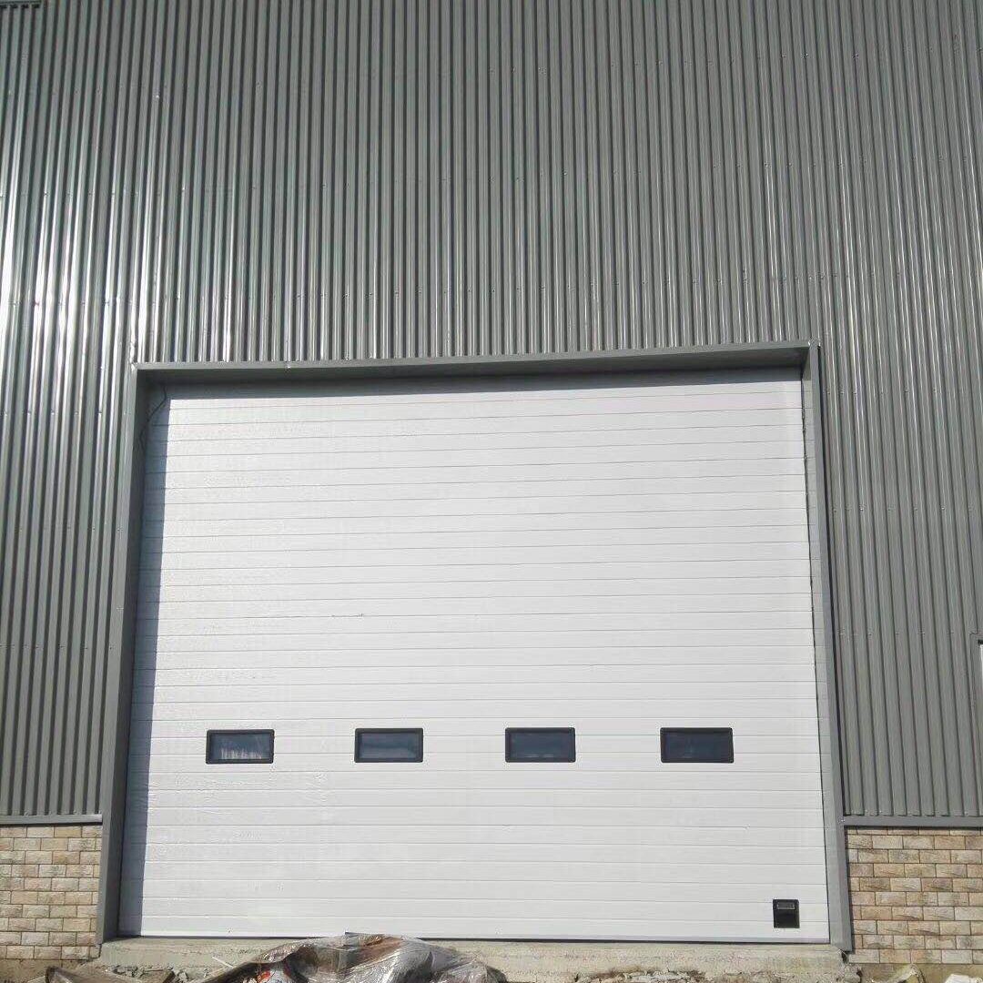 Doorhan Thermal Insulated Industrial Overhead Sectional Door Warehouse Vertical Lifting Dock Door