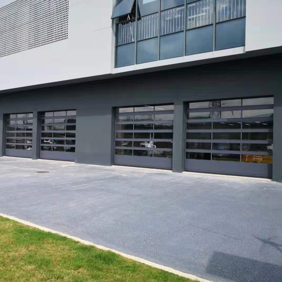 Automatic black aluminum frosted glass sectional sliding gate used commercial garage door