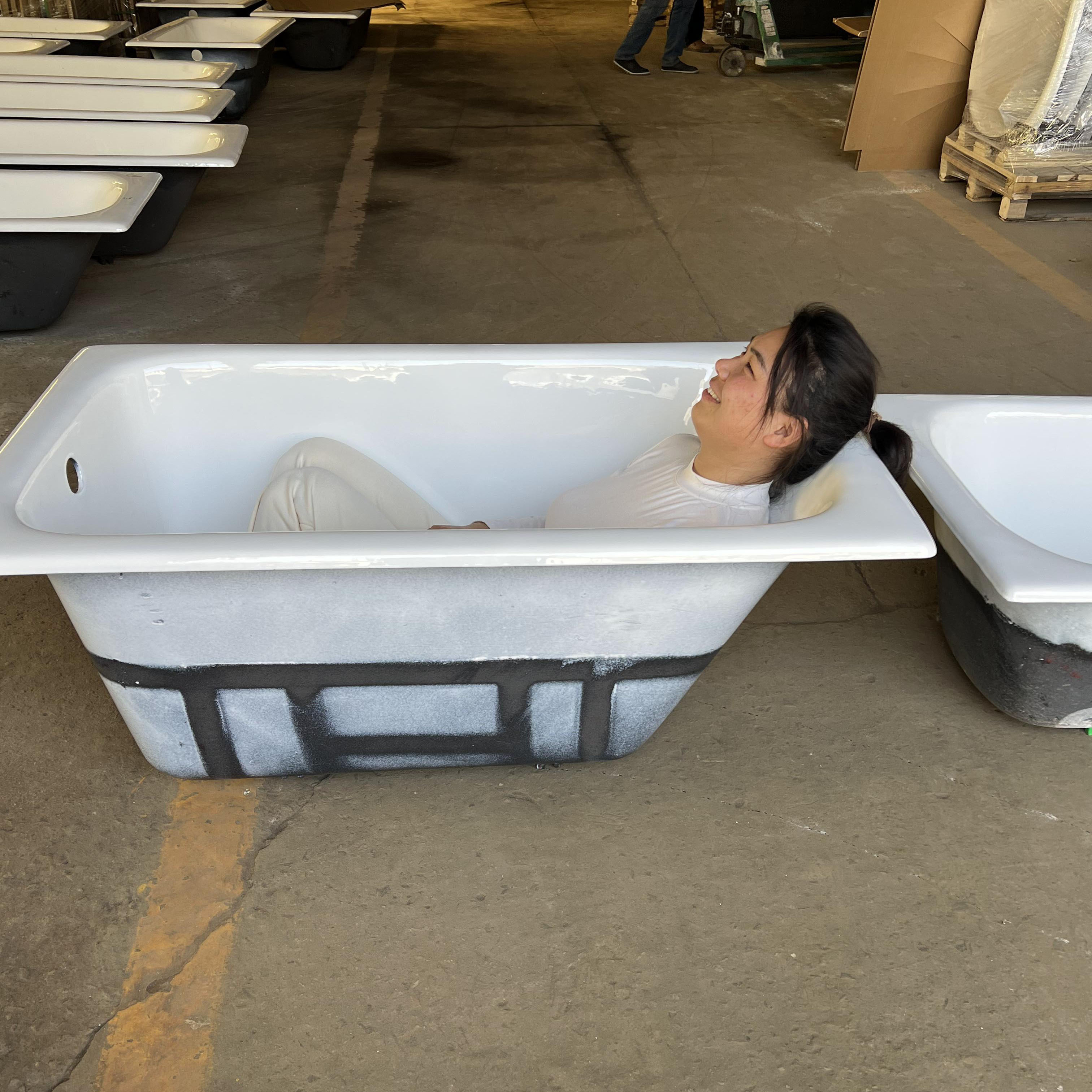 small and deep soaking cast iron built in bathtub