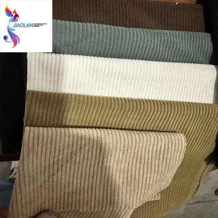 Hot selling polyester woven plain dyed corduroy stock fabric in China textile