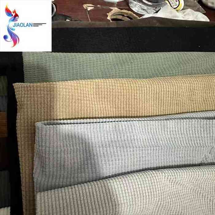 Hot selling polyester woven plain dyed corduroy stock fabric in China textile