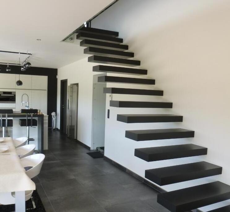 Modern indoor timber floating Staircase uk Design with wood tread stainless steel railings