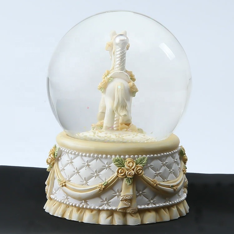 New Popular Design Resin Handcrafts Carousel Snow Globes With Yellow Base Decor