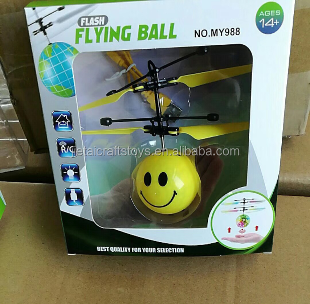 Hot sell induction flying ball smiling expression face design sensor flight toys