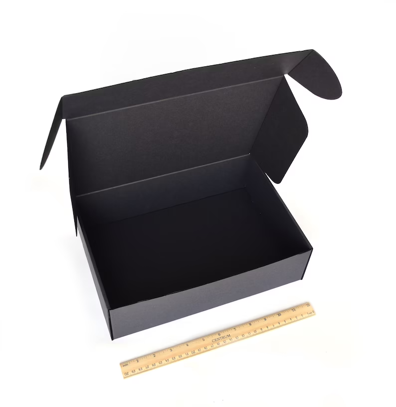 Matte black cardboard box with lid, clothing packaging box