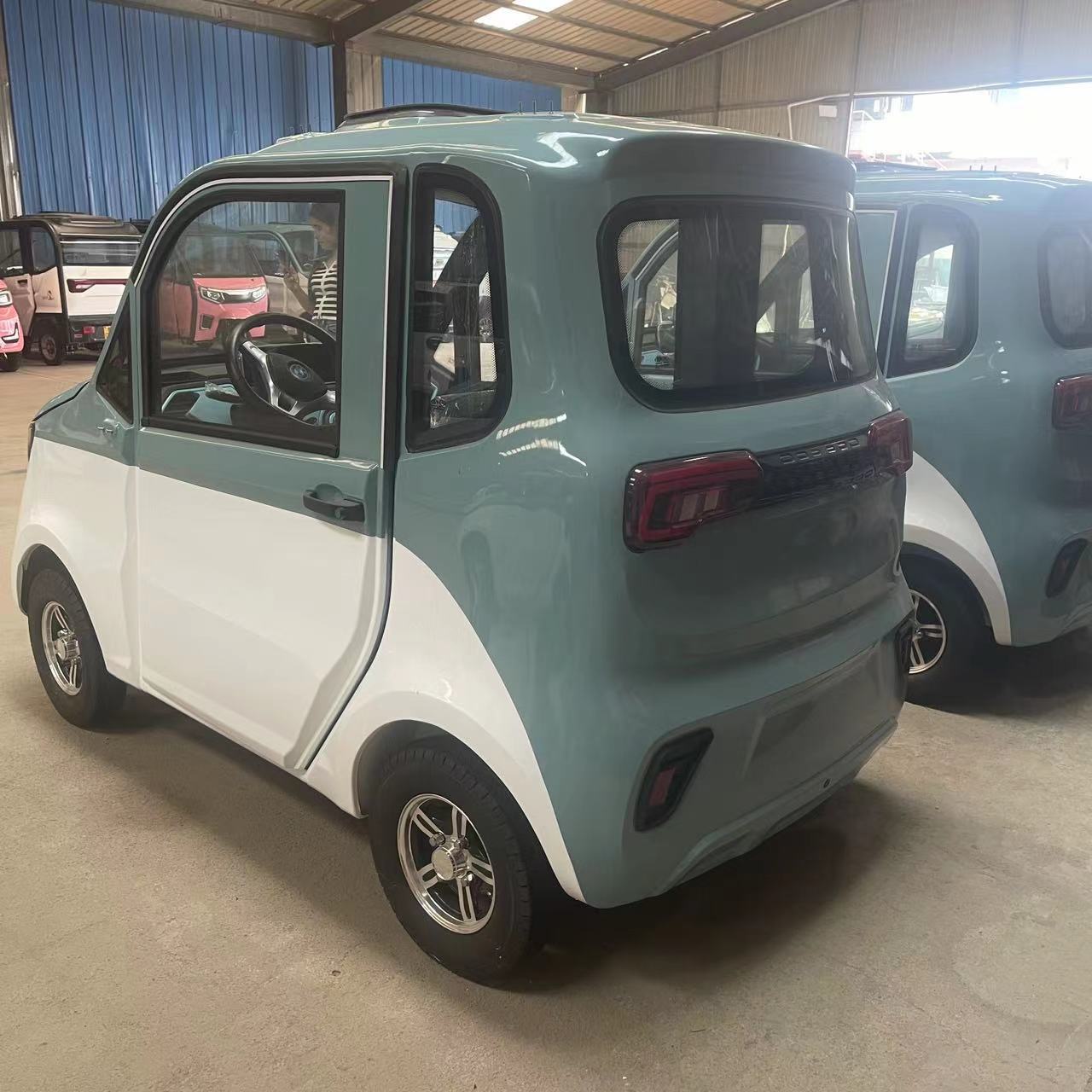 Hot vehicle big motor luxury interior long range electric mini car 4 seats electric mini car new energy electric